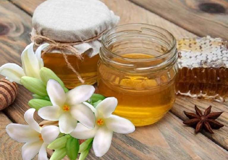 Dùng hoa đu đủ kết hợp với mật ong có thể chữa được bệnh dạ dày